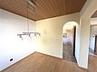Esszimmer mit Zugang zur Küche und Wohnzimmer