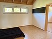 Schlafzimmer mit Übergang ins Ankleidezimmer