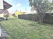 Rasenfläche hinter dem Haus